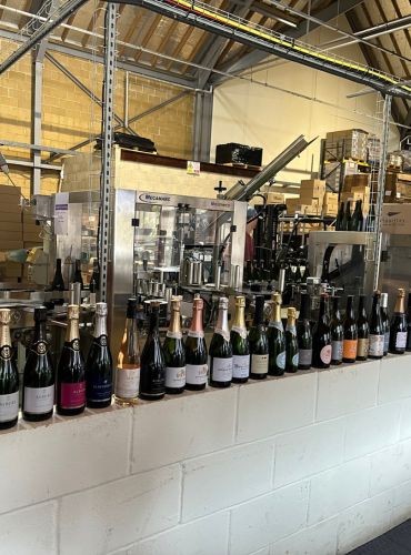 Denbies Wine Estate Bottling Line showing some of the many other producers that bottle their wines at Denbies.